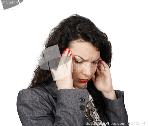 Image of Young businesswoman with headache