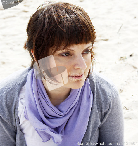 Image of Young woman on the beach