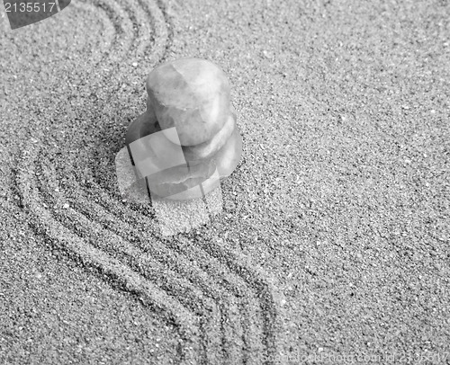 Image of Zen stone in the sand 