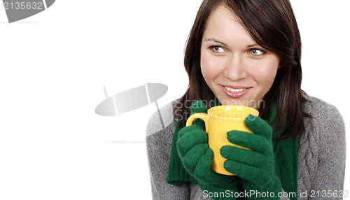 Image of Woman drinking a hot beverage 