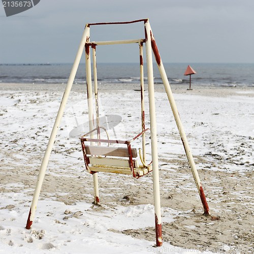 Image of Old swing on the beach 