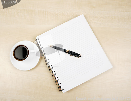 Image of White cup and white page