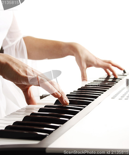 Image of Playing piano