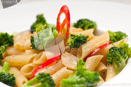 Image of Italian penne pasta with broccoli and chili pepper
