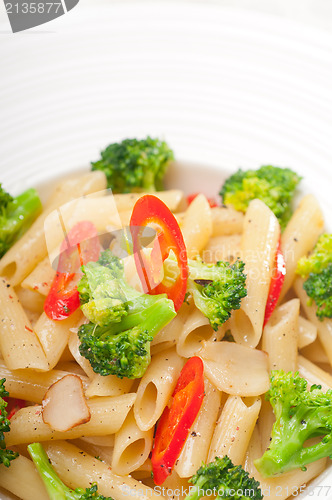 Image of Italian penne pasta with broccoli and chili pepper