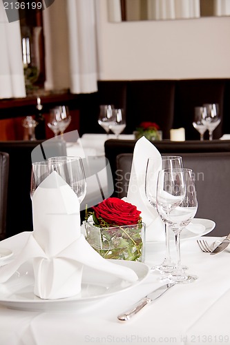 Image of tables in restaurant decoration tableware empty dishware