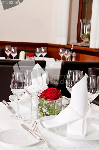 Image of tables in restaurant decoration tableware empty dishware