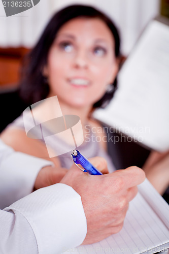 Image of man and woman in restaurant for dinner