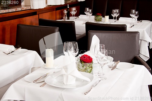 Image of tables in restaurant decoration tableware empty dishware