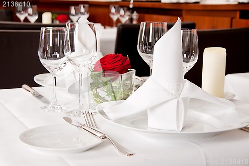 Image of tables in restaurant decoration tableware empty dishware