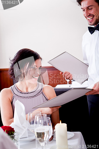 Image of man and woman in restaurant for dinner