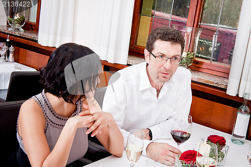 Image of smiling happy people in restaurant