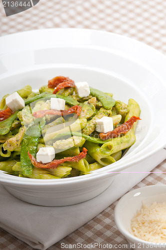 Image of Italian penne pasta with sundried tomato and basil