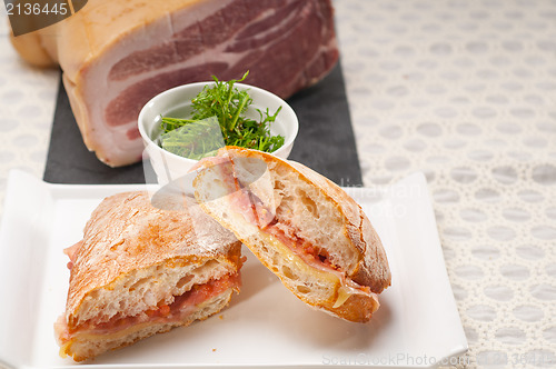 Image of ciabatta panini sandwich with parma ham and tomato
