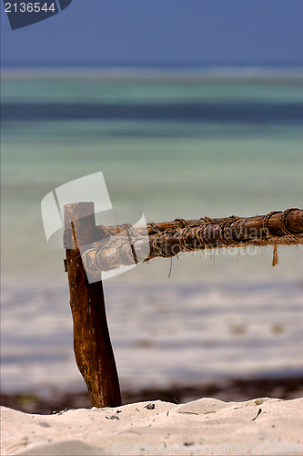 Image of bench rope beach and sea in zanzibar coastline