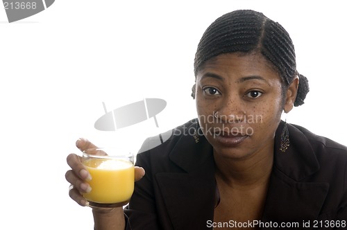 Image of pretty woman drinking orange juice