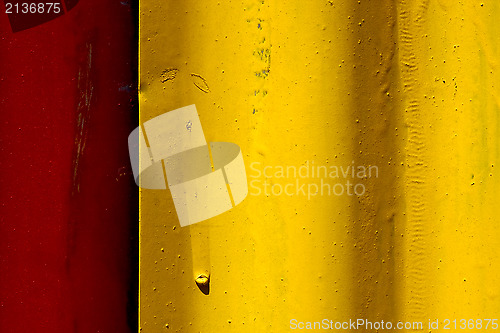 Image of  abstract colored red and yellow iron metal sheet