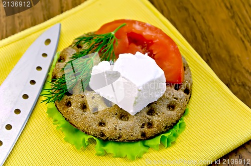 Image of Feta piece with tomato on crispbread