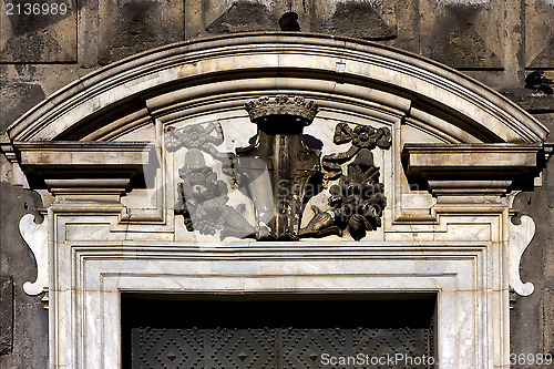 Image of  brown gate  in church 