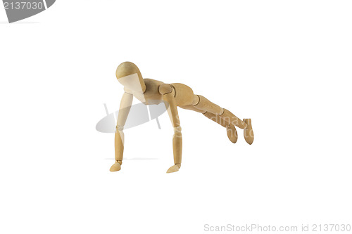 Image of Wooden woman figure in action