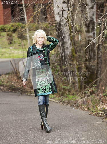 Image of Blonde Woman in Very Colorful Winter Coat