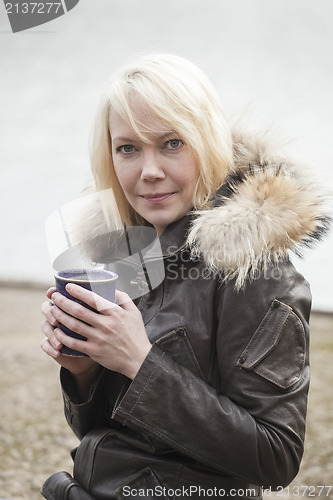 Image of Blonde Woman with Beautiful Blue Eyes