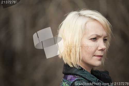 Image of Blonde Woman in Very Colorful Winter Coat