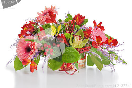 Image of Colorful floral arrangement from lilies, cloves and orchids in c