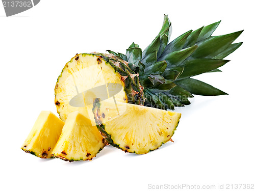 Image of ripe pineapple with slices  isolated on white background