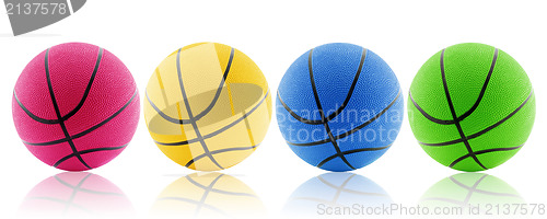 Image of four colorful balls with reflection