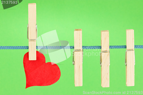 Image of clothesline with a red heart