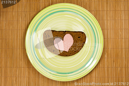 Image of sandwich with heart shaped sausage