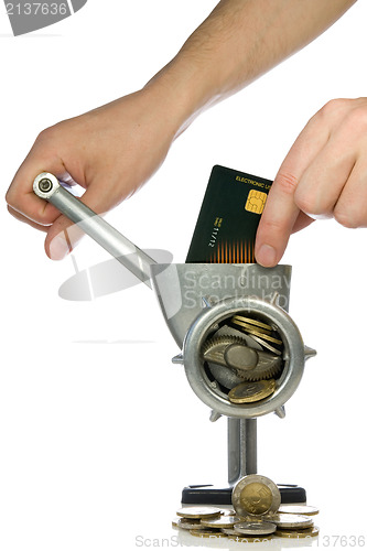 Image of credit card mincing in a meat grinder