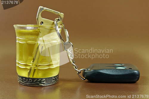 Image of drink and upended car