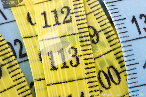 Image of yellow and blue measuring tape 