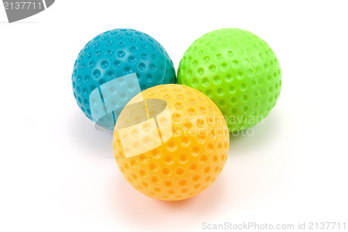 Image of three colored plastic balls