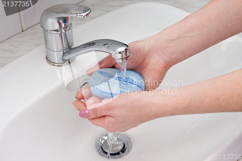 Image of hands wash with soap