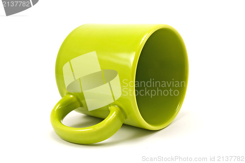 Image of green teacup isolated on a white
