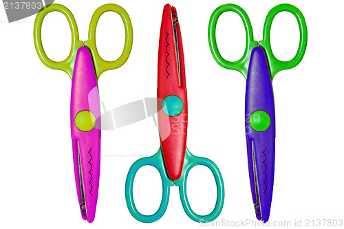 Image of three color scissors 