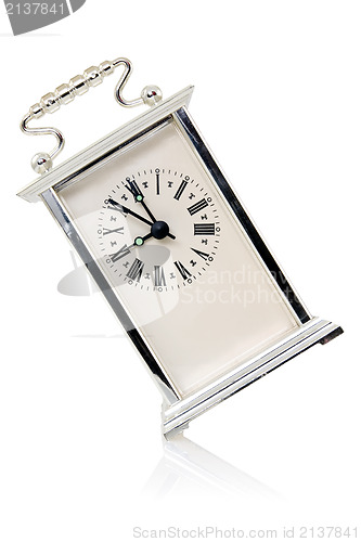 Image of old analogue clock show nine o'clock