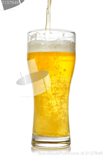 Image of Cold beer pouring into glass