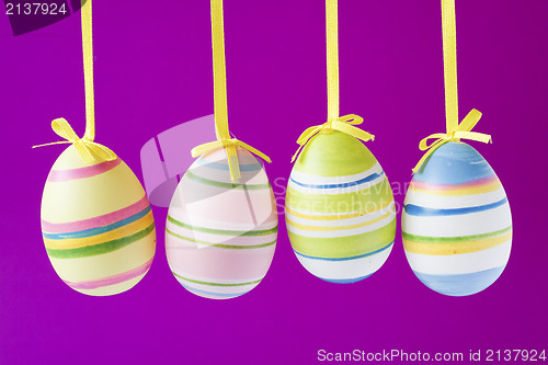 Image of easter eggs  on purple background