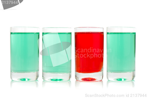 Image of glasses with green and red liquid