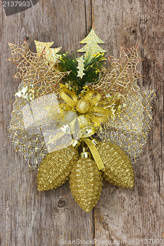 Image of Golden christmas decoration on the wall