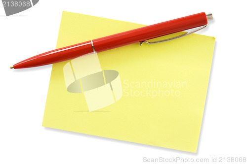 Image of red pen and yellow memo