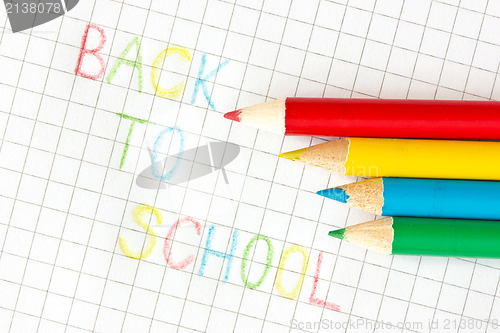 Image of "Back to school" text on squared paper