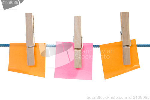 Image of color paper sheets on rope