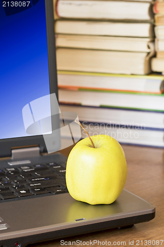 Image of laptop with yellow apple
