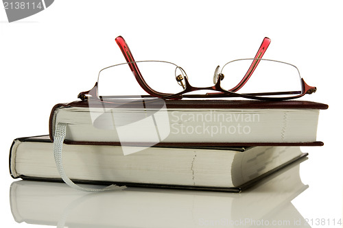 Image of books and glasses