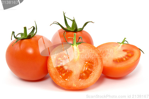 Image of fresh tomatos over a white background